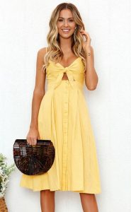 vestido midi casual decote com laço amarelo